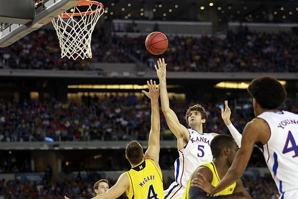 Mitch McGary (4) and Tim Hardaway Jr. (10)