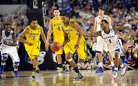 Trey Burke (3), Mitch McGary (4), and Glenn Robinson III (1)