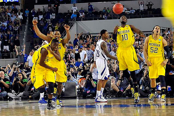 Caris LeVert (23), Glenn Robinson III (1), Tim Hardaway Jr. (10), and Jordan Morgan (52)