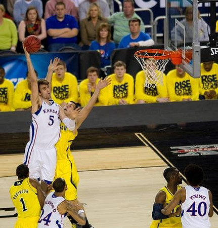 Glenn Robinson III (1), Mitch McGary (4), and Tim Hardaway Jr. (10)