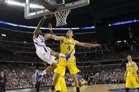 Mitch McGary (4) and Nik Stauskas (11)