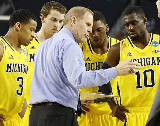 Trey Burke (3), Nik Stauskas (11), John Beilein, Glenn Robinson III (1), and Tim Hardaway Jr. (10)
