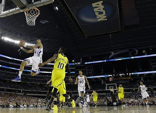Tim Hardaway Jr. (10), Mitch McGary (4), and Glenn Robinson III (1)