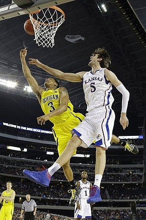 Trey Burke (3) and Spike Albrecht (2)