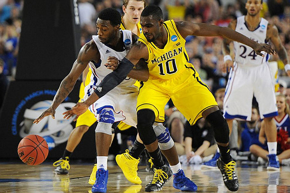 Tim Hardaway Jr. (10) and Nik Stauskas (11)