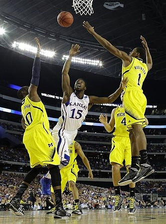 Tim Hardaway Jr. (10), Mitch McGary (4), and Glenn Robinson III (1)