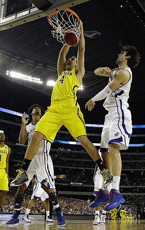 Mitch McGary (4) and Glenn Robinson III (1)