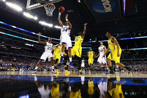 Nik Stauskas (11), Tim Hardaway Jr. (10), Glenn Robinson III (1), and Caris LeVert (23)