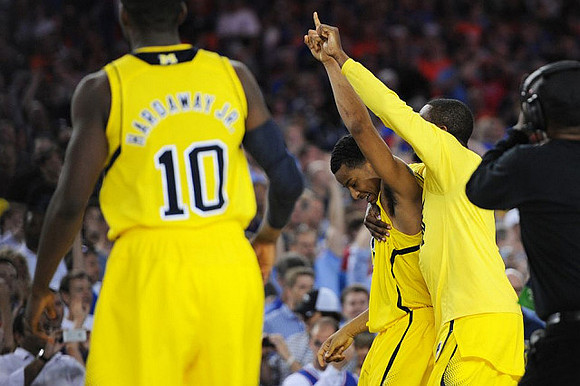 Tim Hardaway Jr. (10), Trey Burke (3), and Corey Person (32)