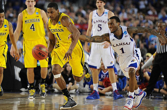 Trey Burke (3), Mitch McGary (4), and Glenn Robinson III (1)