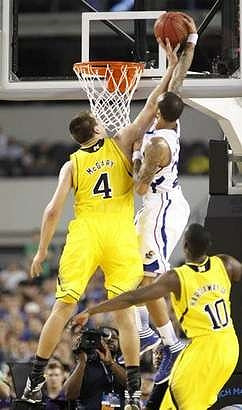 Mitch McGary (4) and Tim Hardaway Jr. (10)