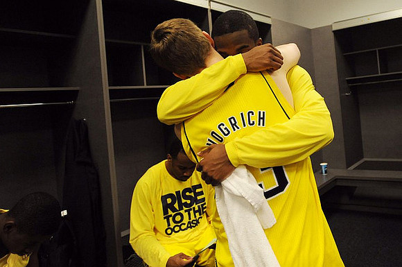 Eso Akunne (5), Corey Person (32), and Matt Vogrich (13)