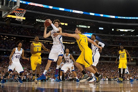 Glenn Robinson III (1), Mitch McGary (4), and Tim Hardaway Jr. (10)