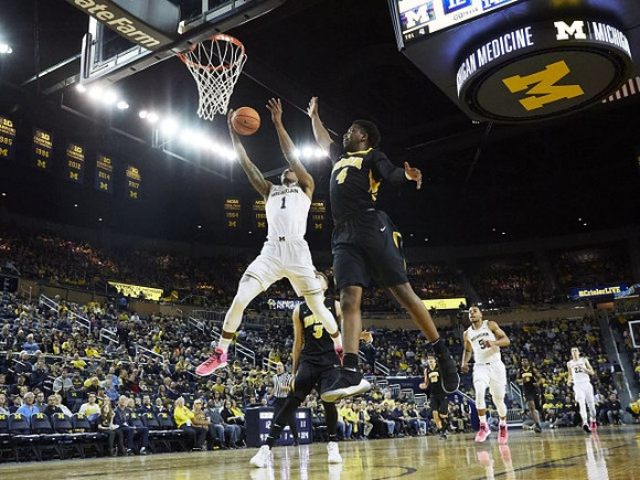 Charles Matthews (1), Jaaron Simmons (5), and Duncan Robinson (22)