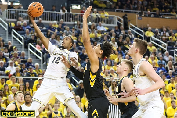 Muhammad-Ali Abdur-Rahkman (12) and Jon Teske (15)
