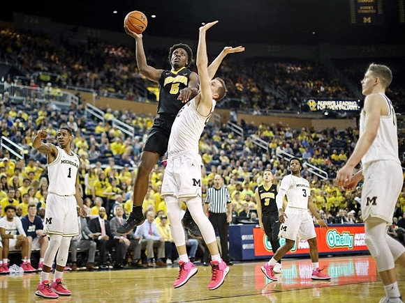 Charles Matthews (1), Duncan Robinson (22), Zavier Simpson (3), and Moritz Wagner (13)
