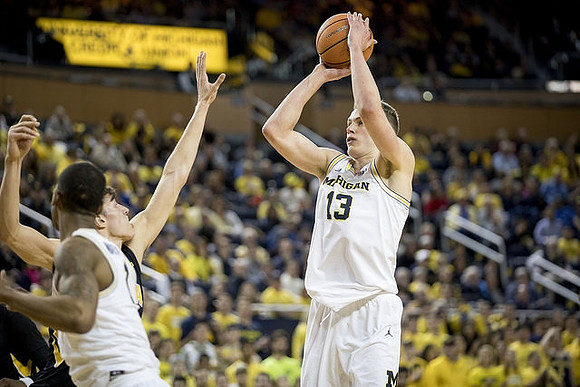 Charles Matthews (1) and Moritz Wagner (13)
