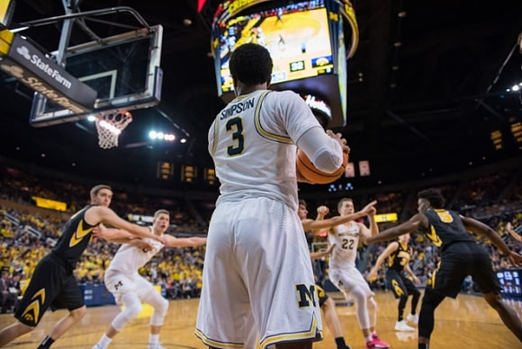 Zavier Simpson (3), Moritz Wagner (13), and Duncan Robinson (22)
