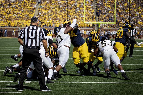 Ben Bredeson (74), Christian Turner (3), and Michael Onwenu (50)