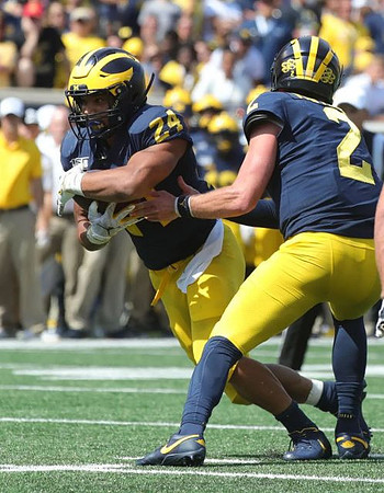 Zach Charbonnet (24) and Shea Patterson (2)