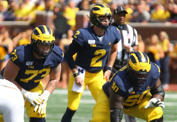Jalen Mayfield (73), Shea Patterson (2), and Michael Onwenu (50)