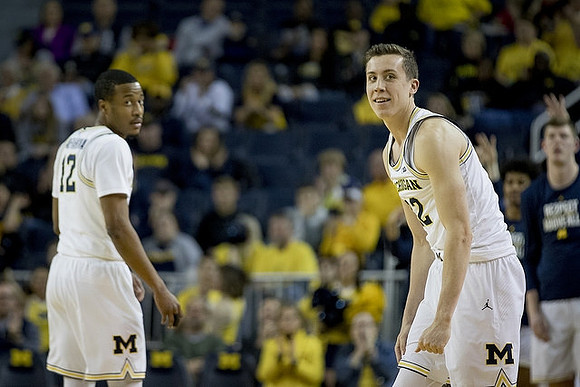 Muhammad-Ali Abdur-Rahkman (12) and Duncan Robinson (22)