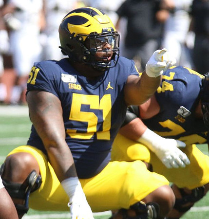 Cesar Ruiz (51) and Ben Bredeson (74)