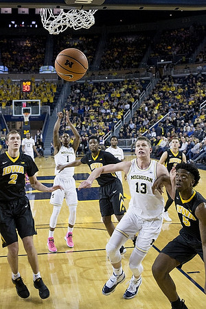 Muhammad-Ali Abdur-Rahkman (12), Charles Matthews (1), Zavier Simpson (3), and Moritz Wagner (13)