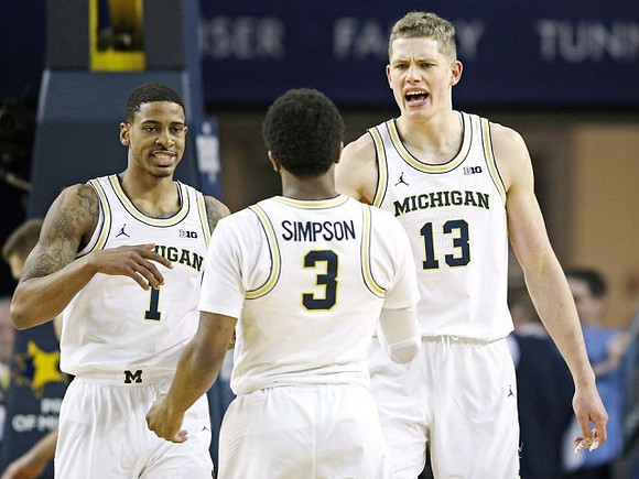 Charles Matthews (1), Zavier Simpson (3), and Moritz Wagner (13)