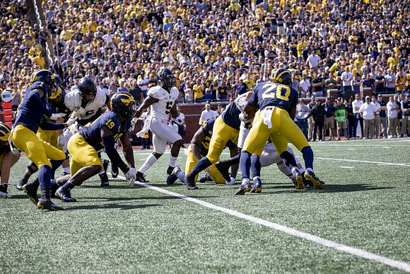 Ambry Thomas (1), Kwity Paye (19), and Brad Hawkins (20)