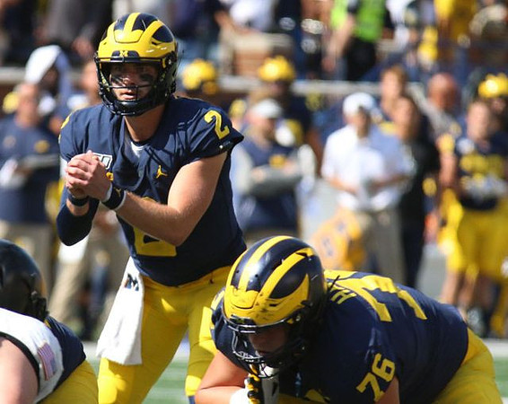 Shea Patterson (2) and Ryan Hayes (76)