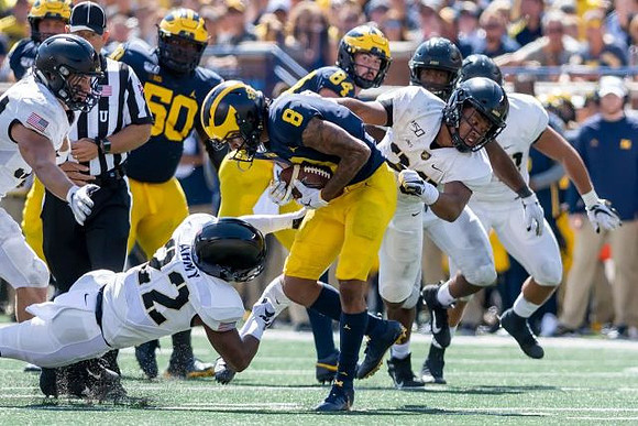 Michael Onwenu (50), Ronnie Bell (8), and Sean McKeon (84)