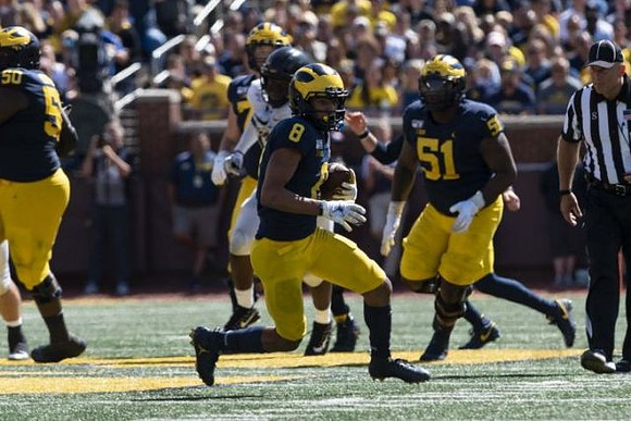 Michael Onwenu (50), Ronnie Bell (8), and Cesar Ruiz (51)