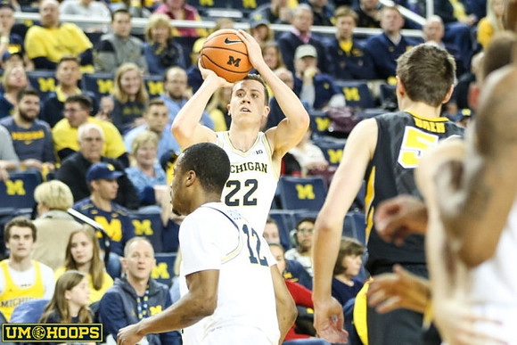 Muhammad-Ali Abdur-Rahkman (12) and Duncan Robinson (22)