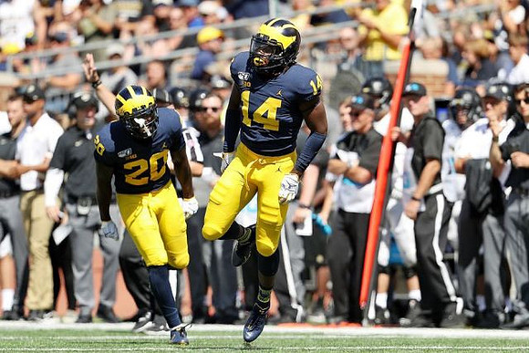 Brad Hawkins (20) and Josh Metellus (14)