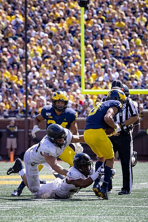 Zach Charbonnet (24) and Ronnie Bell (8)