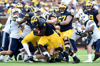 De'Veon Smith (4), Maurice Ways (85), Mason Cole (52), Kyle Kalis (67), and Henry Poggi (19)