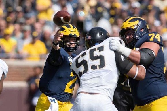 Shea Patterson (2) and Ben Bredeson (74)