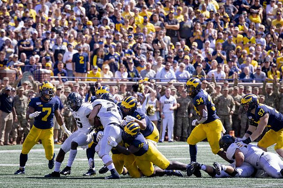 Khaleke Hudson (7), Kwity Paye (19), Carlo Kemp (2), Jordan Anthony (34), and Aidan Hutchinson (97)