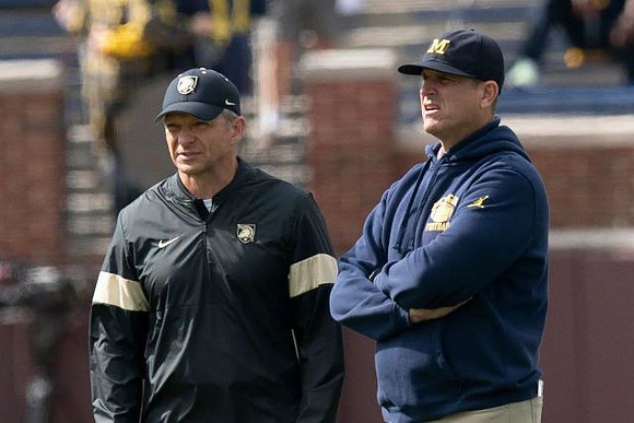 Army Head Coach Jeff Monken and Jim Harbaugh