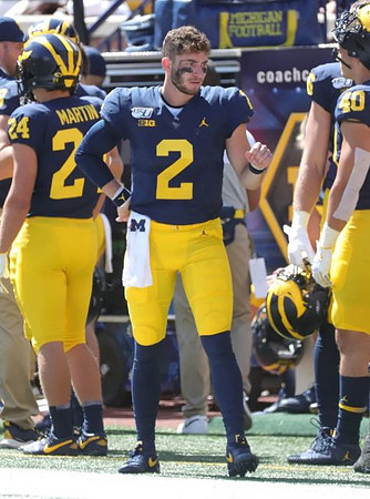 Jake Martin (24), Shea Patterson (2), and Ben VanSumeren (40)