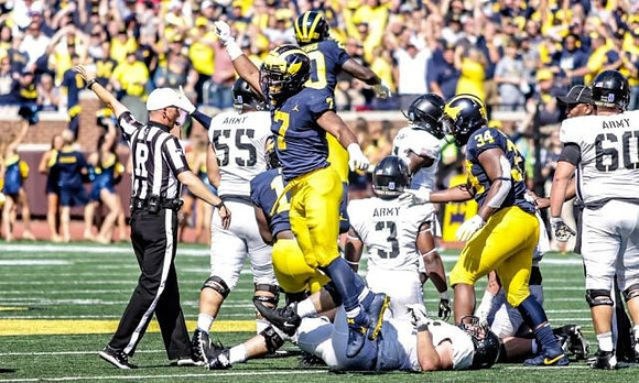 Khaleke Hudson (7), Brad Hawkins (20), and Jordan Anthony (34)