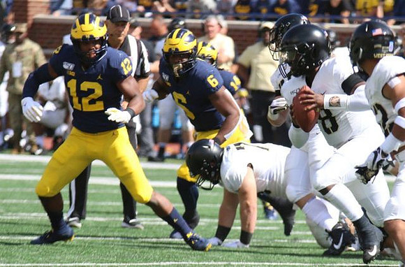 Josh Ross (12), Josh Uche (6), and Josh Metellus (14)