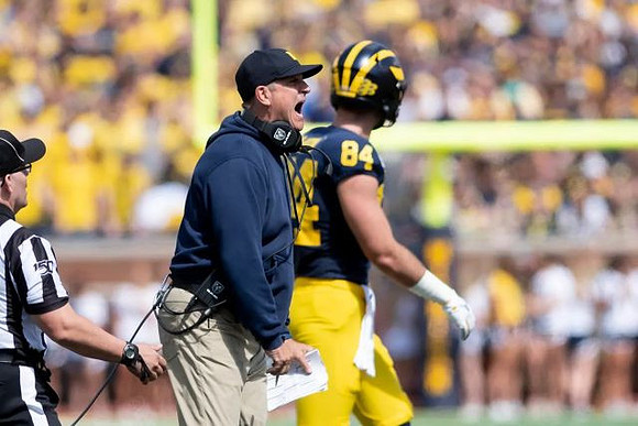 Jim Harbaugh and Sean McKeon (84)