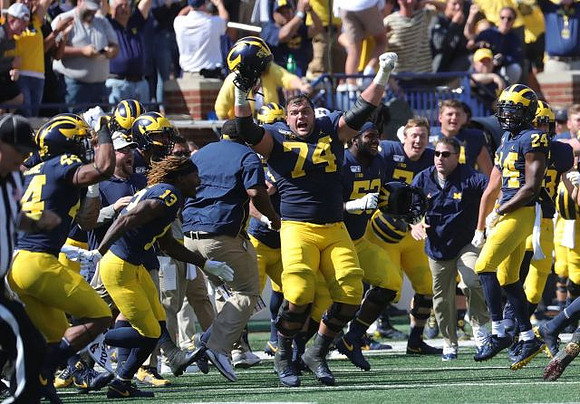 Cameron McGrone (44), German Green (13), Ben Bredeson (74), and Lavert Hill (24)