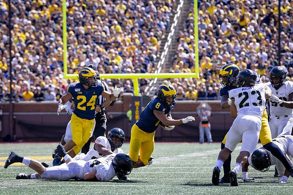 Zach Charbonnet (24) and Ronnie Bell (8)