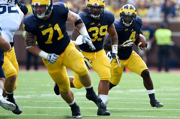 Ben Braden (71), Sione Houma (39), and De'Veon Smith (4)