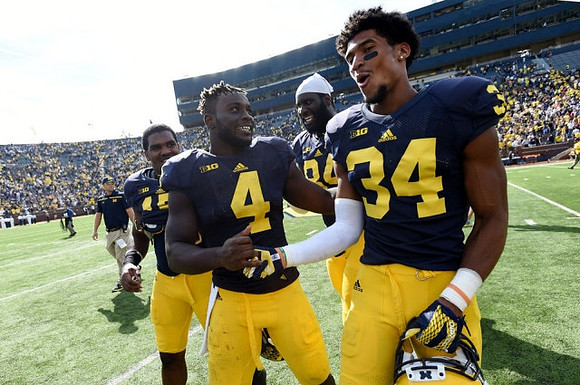 De'Veon Smith (4), A.J. Williams (84), and Jeremy Clark (34)