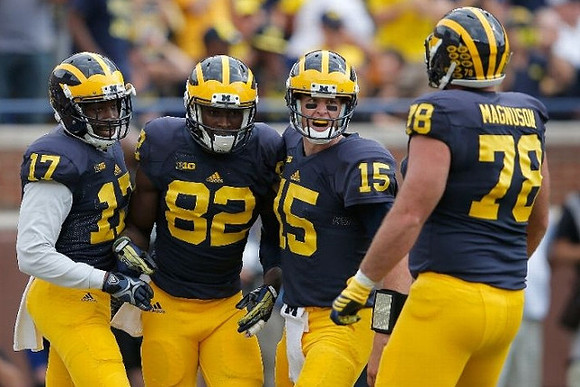 Freddy Canteen (17), Amara Darboh (82), Jake Rudock (15), and Erik Magnuson (78)