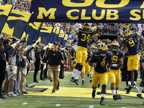 Jim Harbaugh and Michigan Team